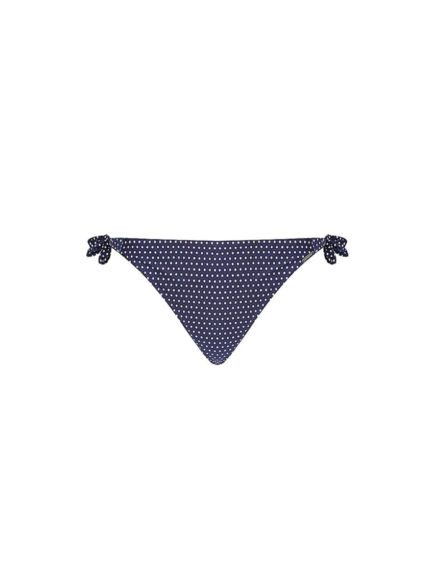 Navy blue bikini bottom with white polka dots on a white background