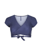 Navy blue polka dot top with a tie back