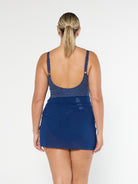 model showing back of navy mesh tie side skirt