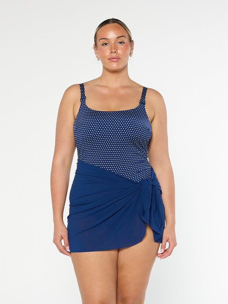 model wearing navy short mesh skirt