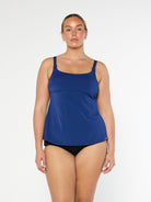 model wearing navy chlorine resistant tankini 