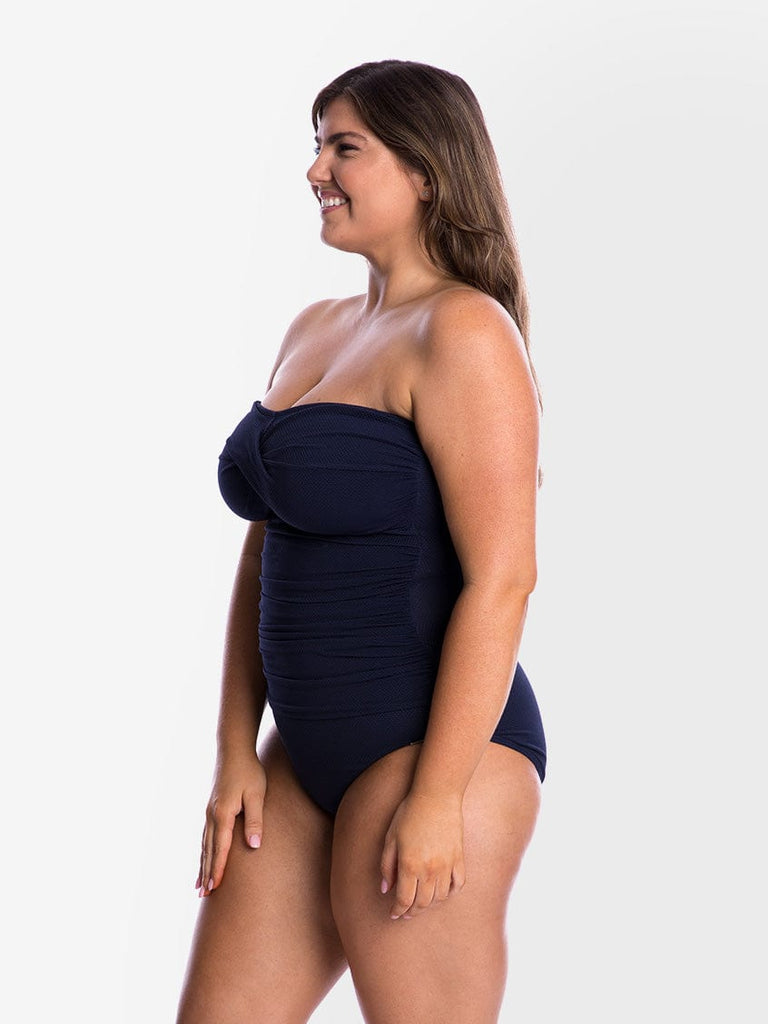 model showing side of navy honey comb one piece