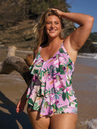 model wearing pink floral tankini top