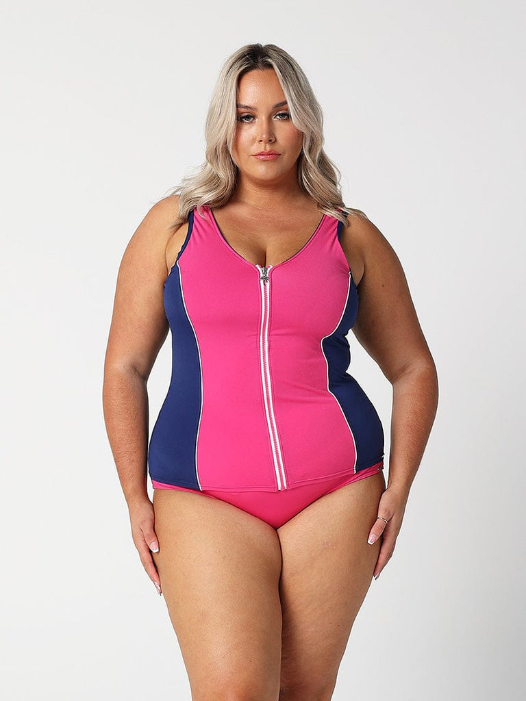 model wearing pink high waisted swim bottoms with matching tankini