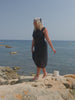 model wearing black maxi length mesh dress in Spain