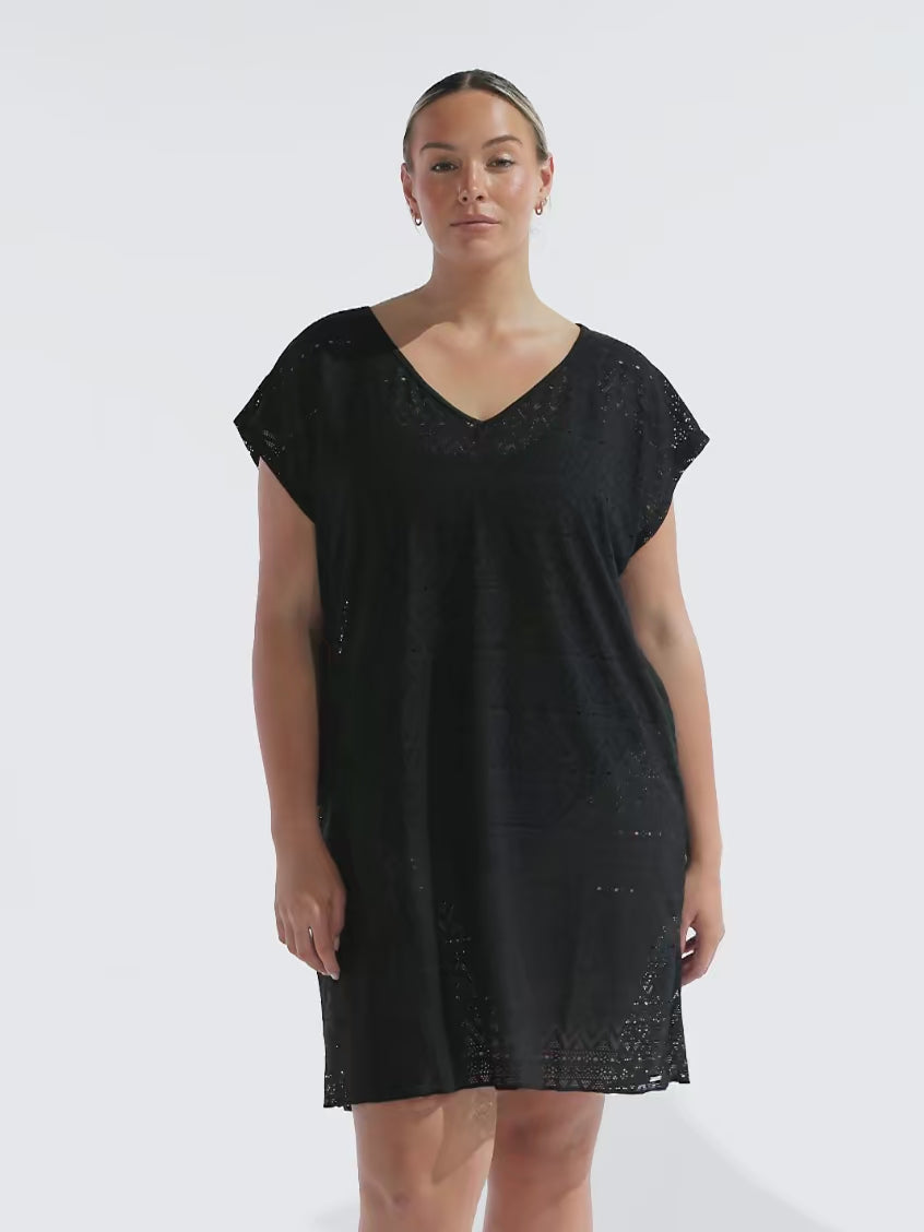 model wearing black mesh beach dress