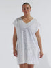 model wearing white mesh beach cover up dress