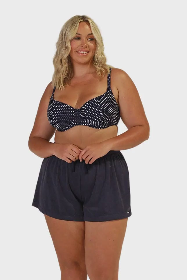 model wearing navy terry towelling shorts