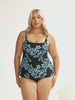 model wearing blue and black floral women's tankini top