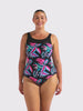 Woman in studio wearing high neck mesh one piece with floral leaf print