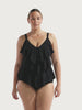 Model wearing black 3 tier tankini top