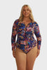 model wearing navy floral long sleeve zip front swimsuit