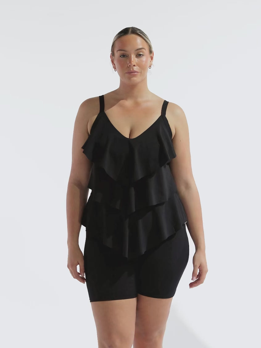 model wearing black bike pants with tiered tankini