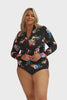 Model wearing black floral zip front long sleeve rash vest