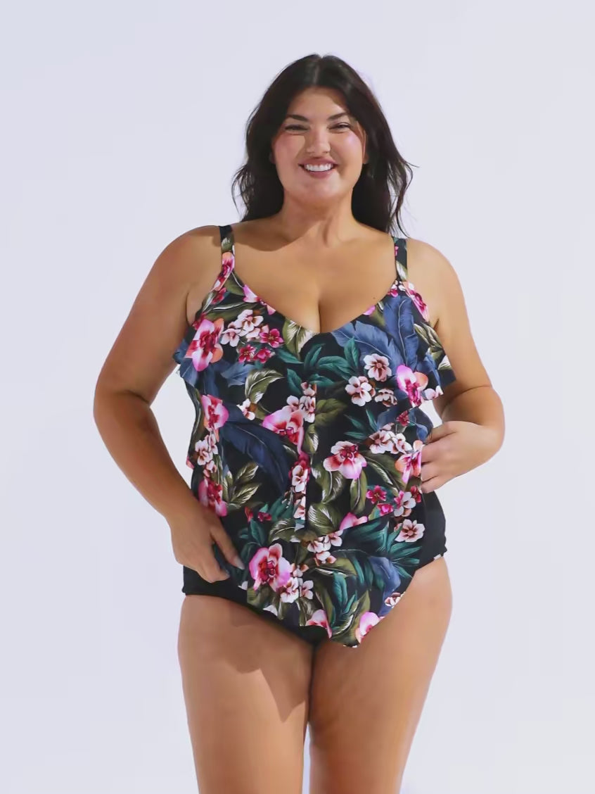 Video of model in studio wearing floral tiered tankini top