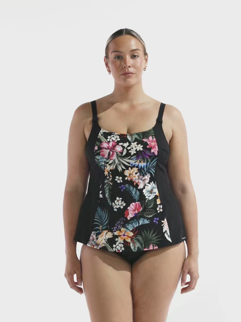 model wearing black floral women's tankini top
