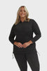 Model wearing long sleeve rash vest with ruched sides