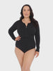 model wearing black zip front long sleeve women's one piece