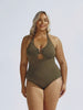 Blonde model wearing halter one piece in khaki textured fabric