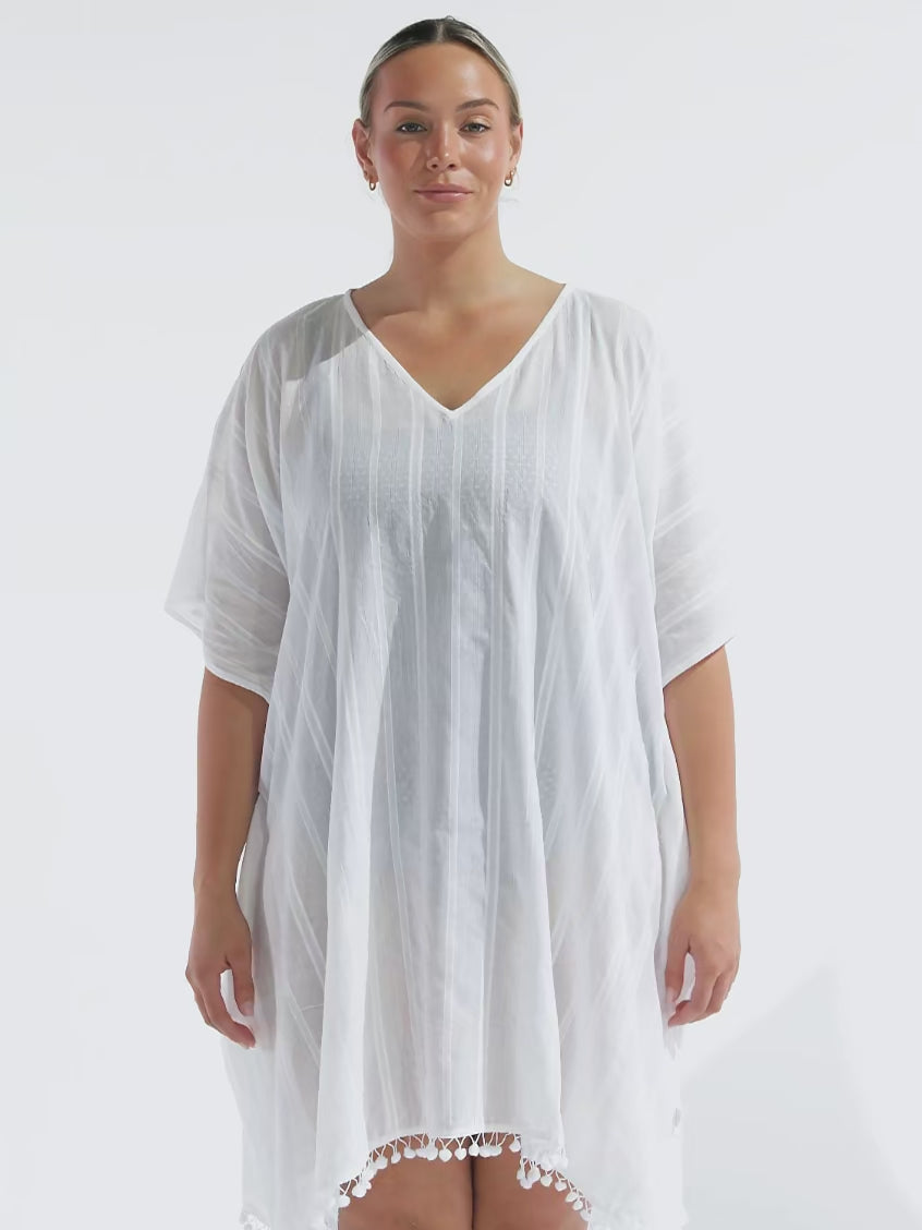 model wearing white cotton kaftan