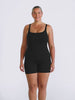 Blonde model in studio wearing a tank one piece boyleg in black chlorine resistant