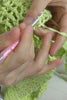 Crocheting process of woven beach bag