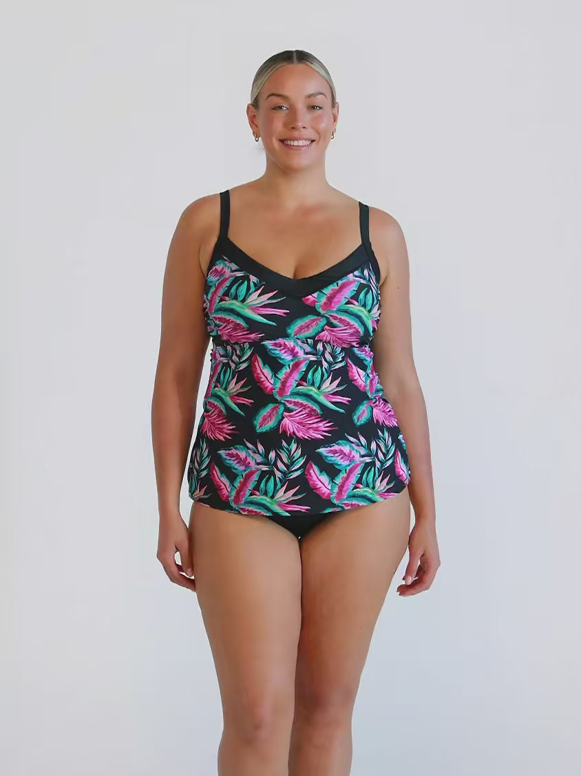 Blonde model wearing a floral print and blue underwire tankini