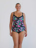 Blonde model wearing a floral print and blue underwire tankini
