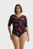 Model wears pink floral chlorine resistant zip front one piece