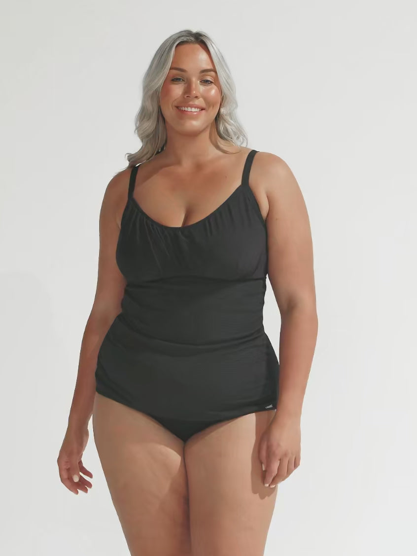 model wearing black honey comb women's tankini