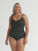 model wearing black honey comb women's tankini