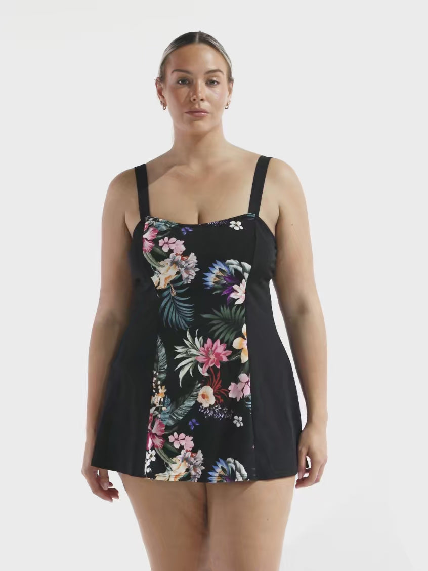 model wearing black floral women's swim dress
