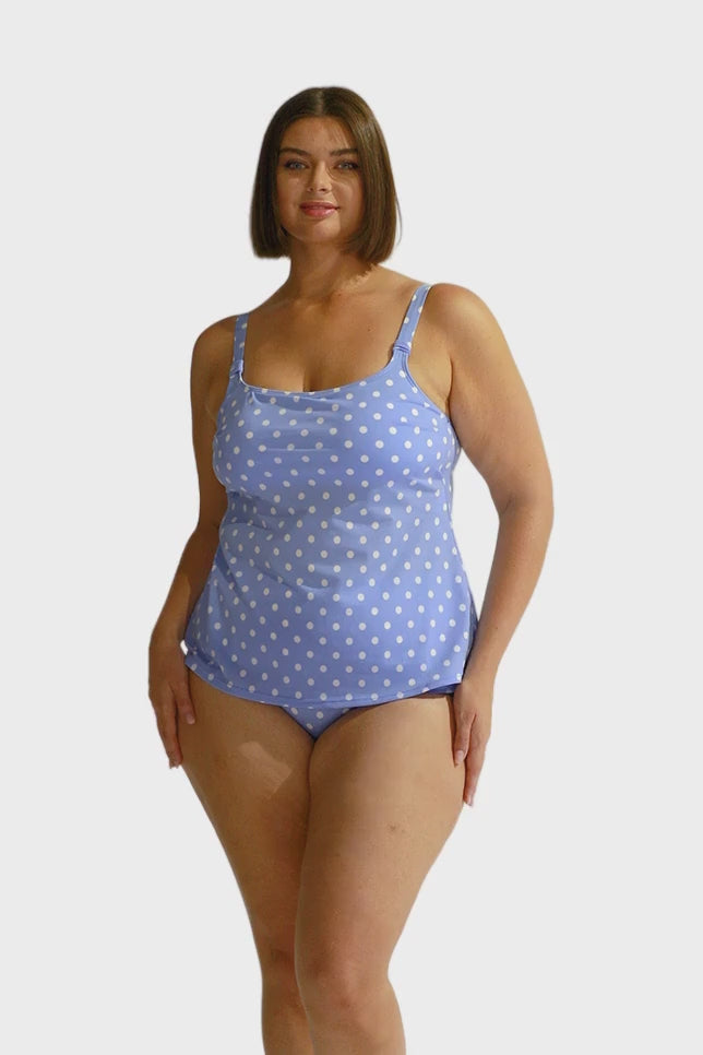 Brunette model wearing light blue tankini and high waisted pant swimwear