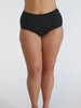 Woman in studio wearing high waisted chlorine resistant pant