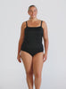 Blonde model in studio wearing textured tankini with removable straps 