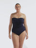 model wearing navy honey comb textured strapless one piece