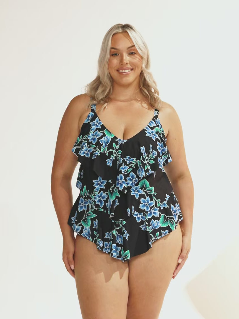 model wearing blue floral 3 tier tankini top