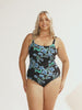 model wearing blue and black floral women's one piece