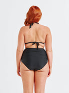 model showing back of black ruched swim pant
