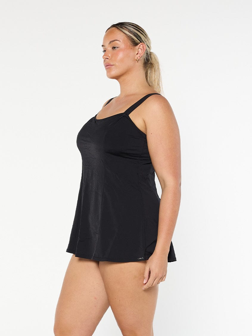 model showing side of women's black swim dress