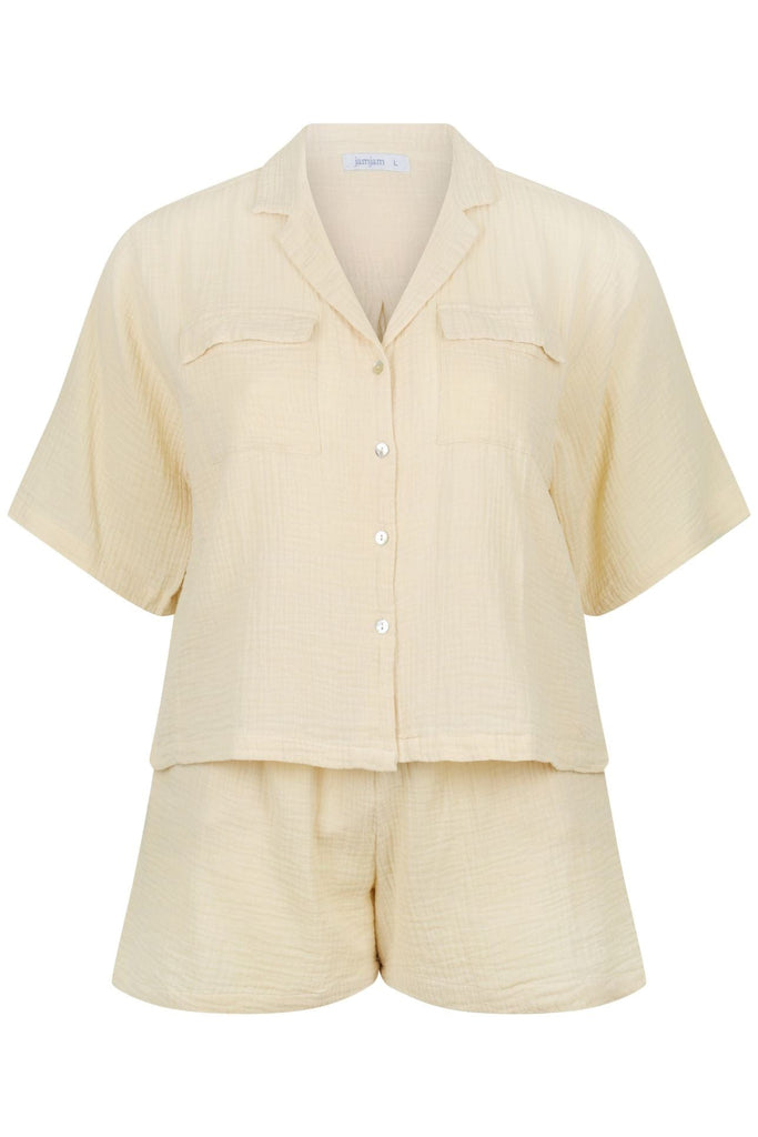 ghost mannequin of sand colour short set, short sleeve button through with matching short pants