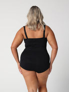 model showing full coverage bottom of black women's one piece