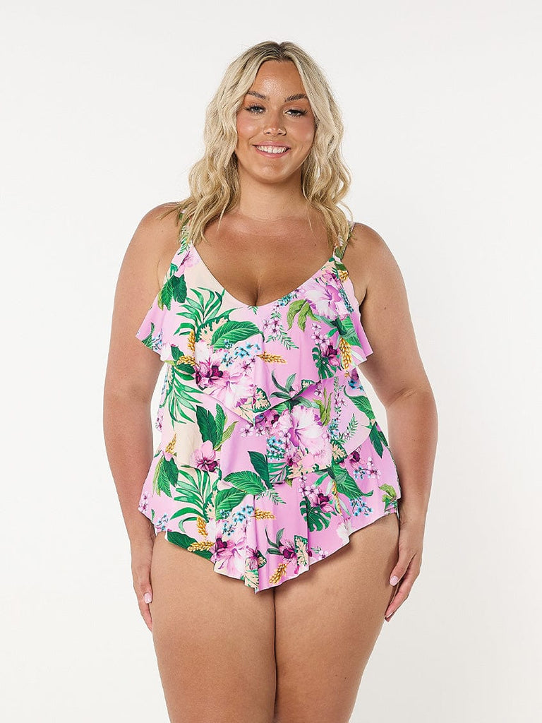model wearing pink layered tankini top