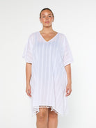 model wearing white cotton kaftan