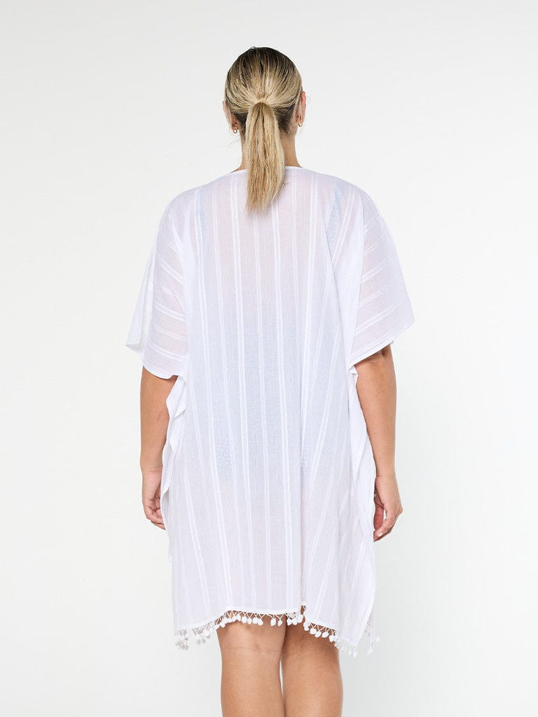 model wearing women's white kaftan