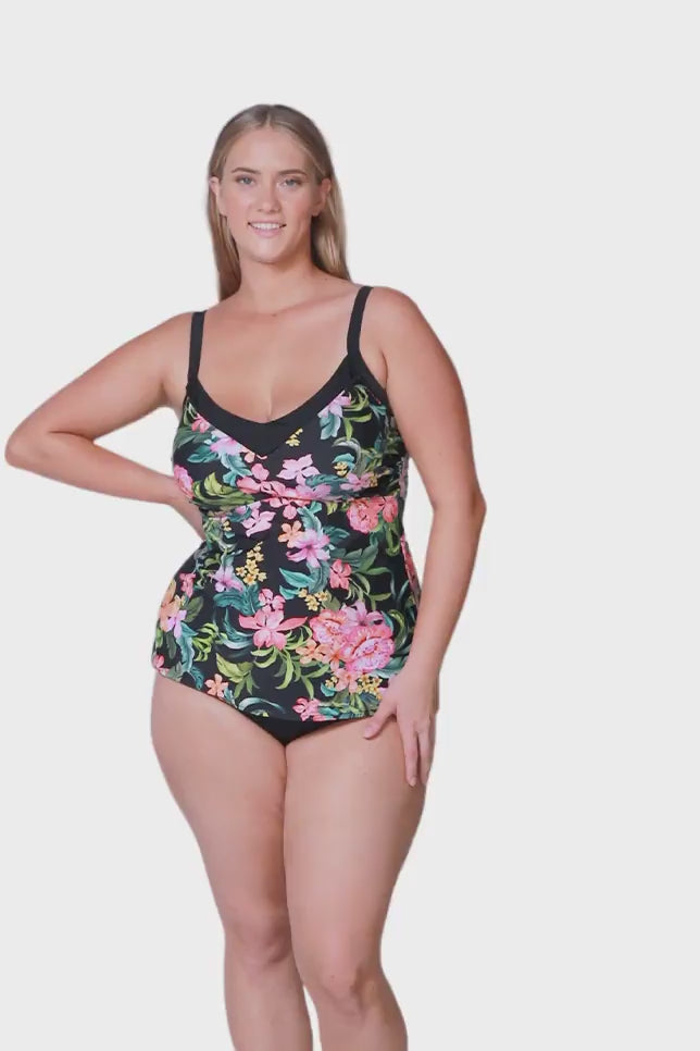 plus size blonde model wearing black and green tropical tankini top with underwire