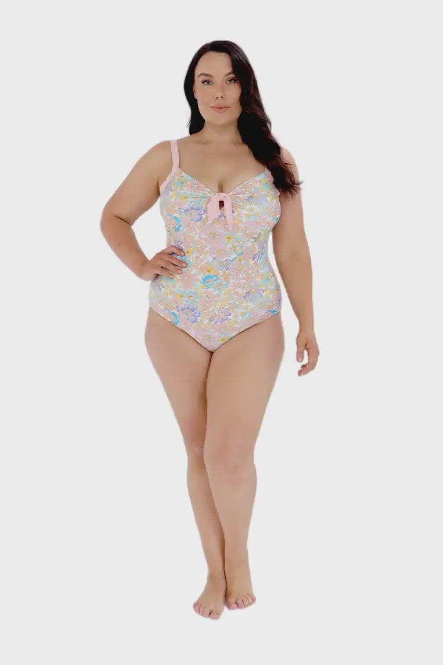 pink floral one piece with bow
