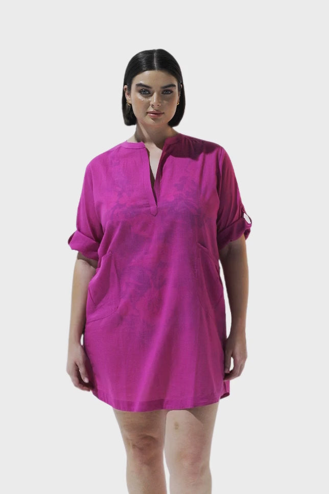 Brunette model wearing pink over shirt