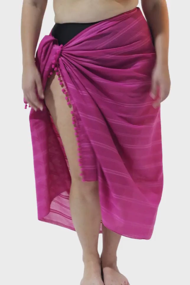 Model wearing pink sarong