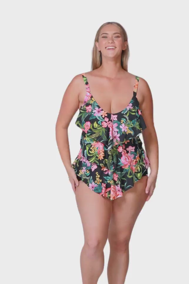 plus size blonde women wears tropical print tankini top with 3 ruffles on the front